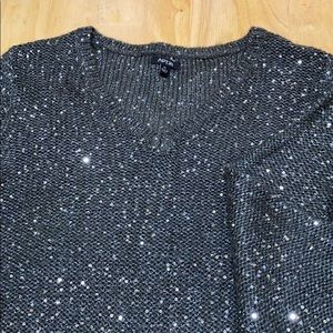 Woman’s Black sweater with silver embellishments
